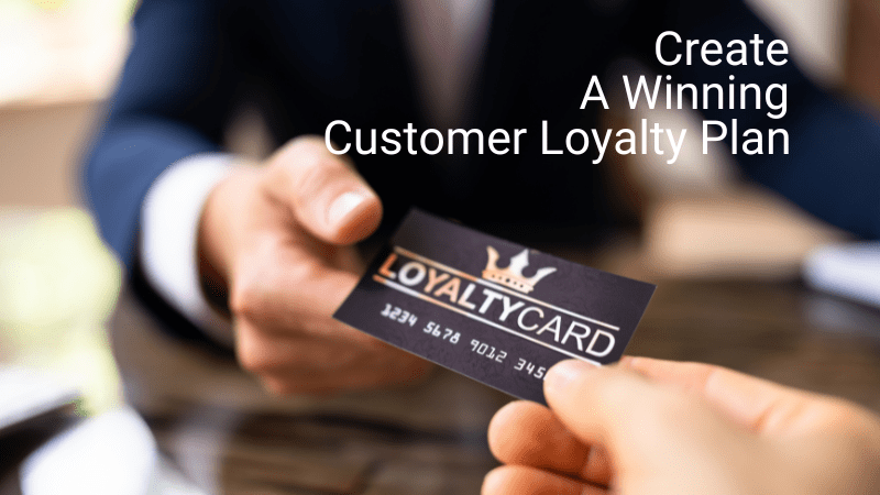 A man with a winning customer loyalty plan card