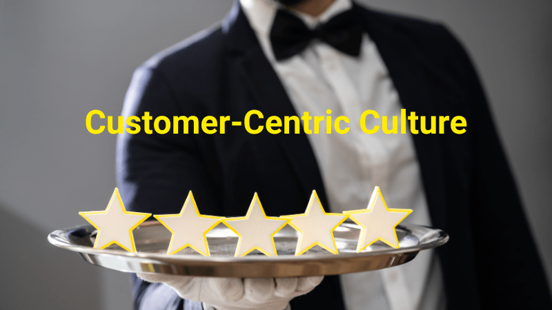 Man holding a 5 star platter - customer-centric culture